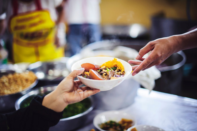 Starving,Homeless,People,Receive,Food,From,Volunteers,Who,Serve,Humane: